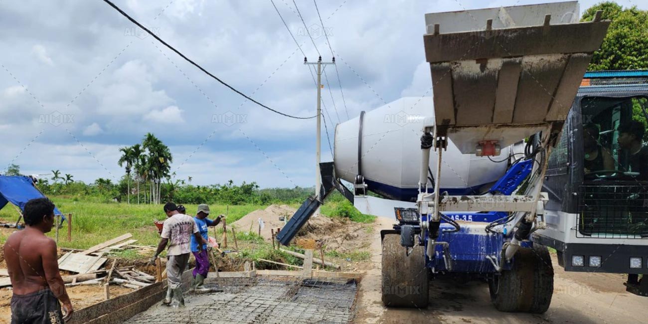 AS-3.5 self-loading concrete mixer paving roads in Indonesia
