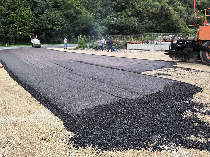 asphalt aggregates are paved for asphalt road
