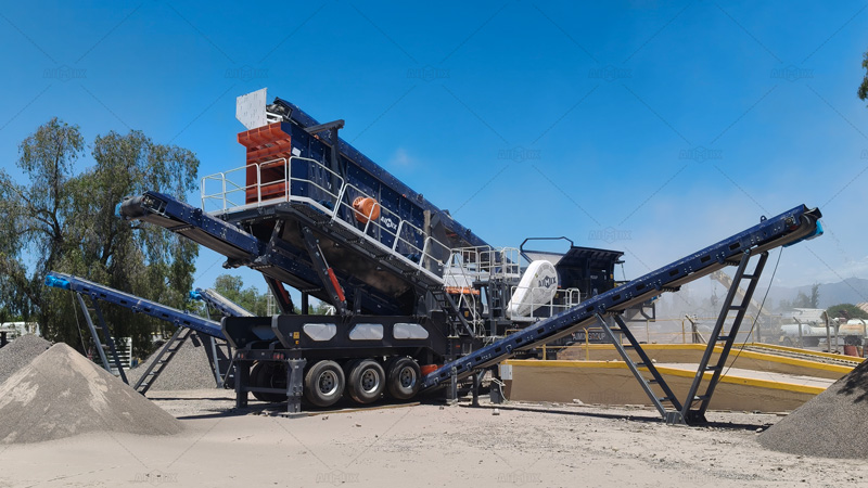 Мобильная дробилка для гранита производительностью 60 тонн в час для производства песка и гравия.